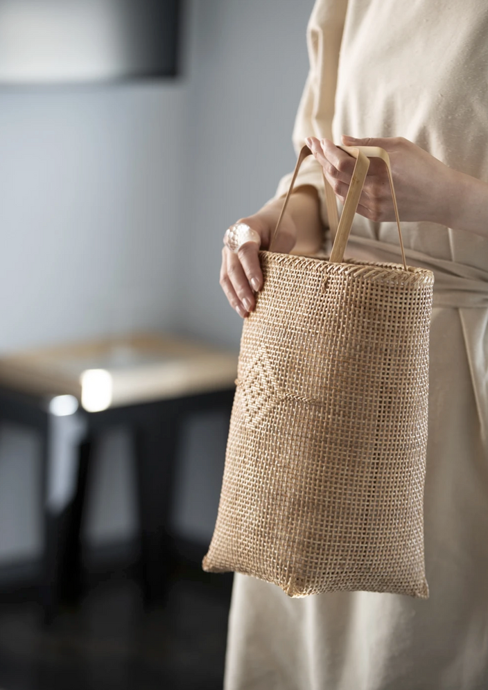 Wrap yourself in suppleness with a rattan bag